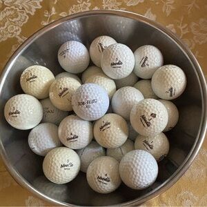 Twenty two Noodle, 7 Top Flight, 1 Pinnacle, and 2 TiTech used golf balls.